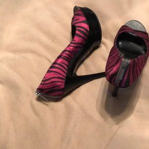 Zebra pattern. Back zipper heels. Open toed